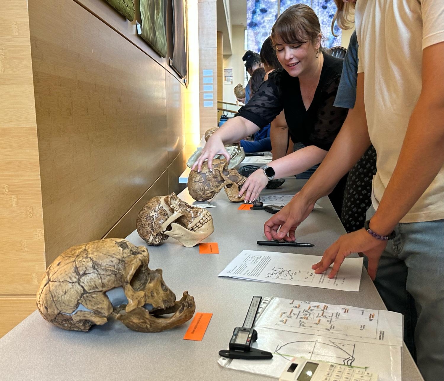 Senior Lecturer Kimberly Paczolt helps students with a hands-on activity during a class in October. Credit: Katie Bemb.