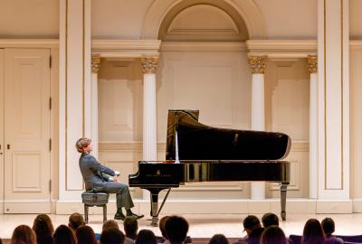 Jacob Goldman performing piano on stage at Carnegie Hall. Photo courtesy of Jacob Goldman.