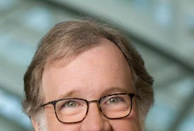 Evolutionary Biologist Sean B. Carroll, bearded with glasses.