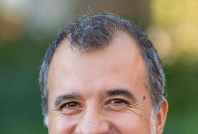 Carlos Machado headshot