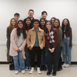 Team Fungi students pose with Myles Poulin