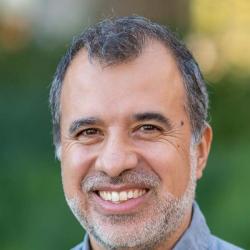 Carlos Machado headshot
